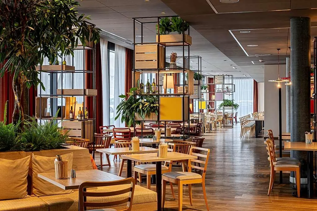 **** Отель Intercityhotel Zuerich Airport Рюмланг Швейцария